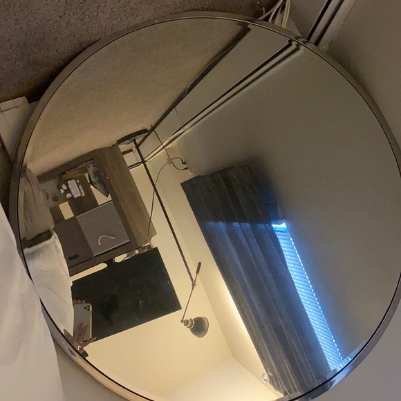 Round silver mirror